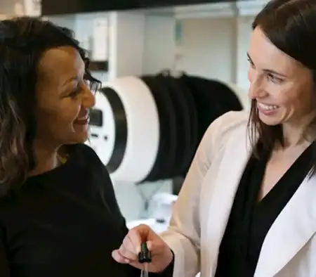 aesthetician and client discussing treatment